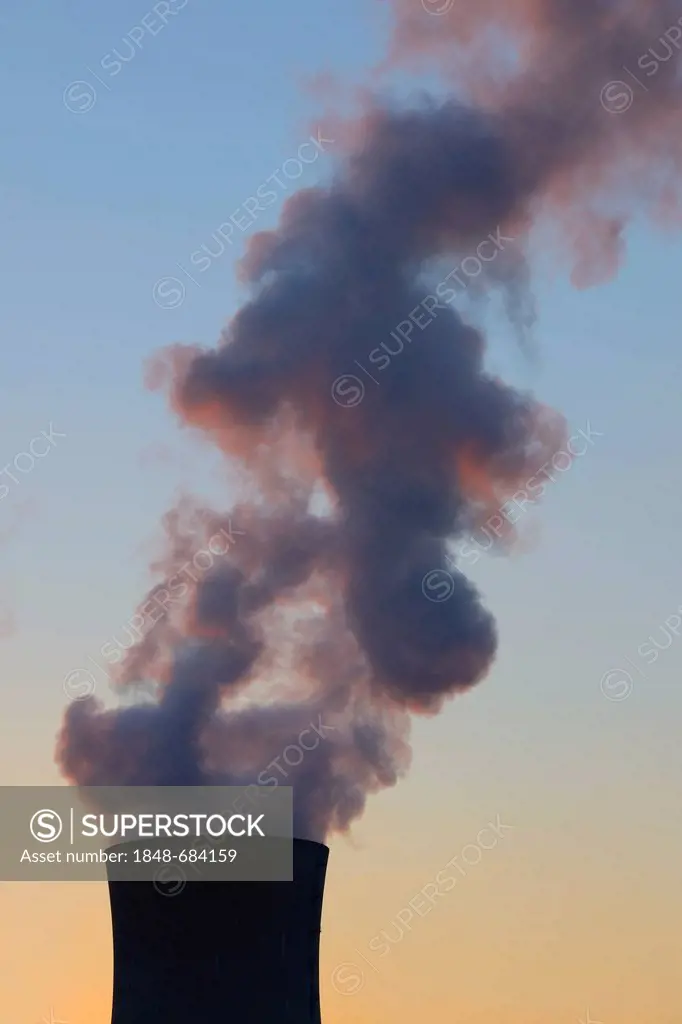 Grafenrheinfeld nuclear power plant operated by E.ON, cooling tower silhouetted at dusk, Schweinfurt, Bavaria, Germany, Europe