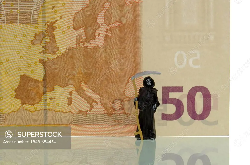 Death standing in front of a 50 euro note, symbolic image for the crisis of the euro