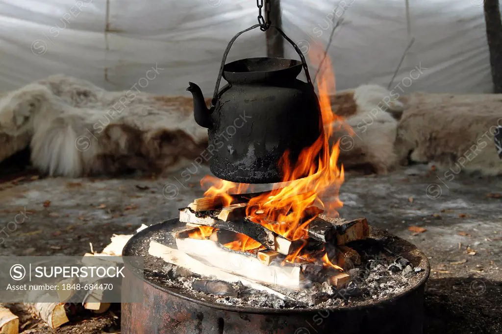 Making coffee over an open fire, Lappland, Sweden, Europe