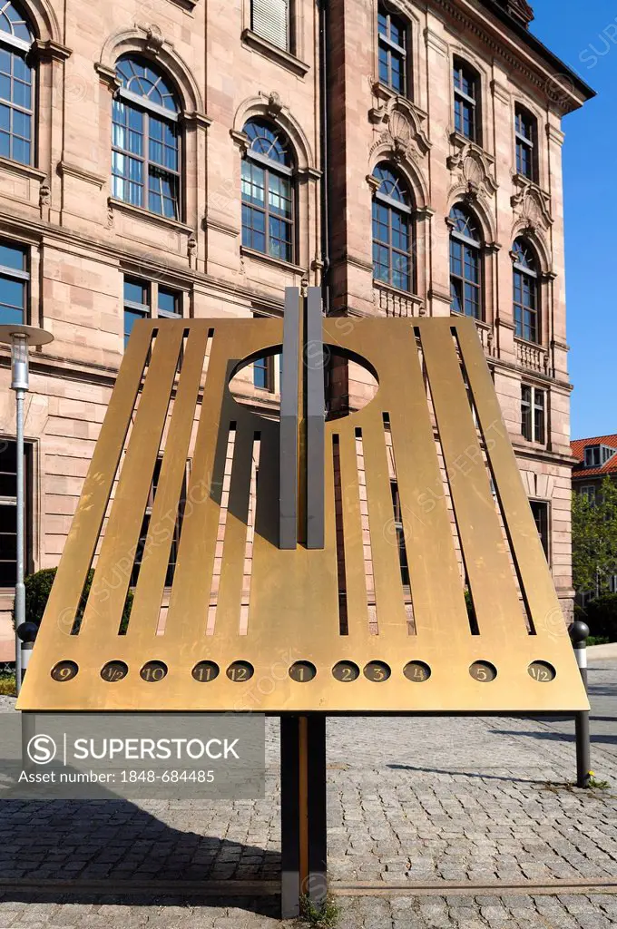 Modern polar sundial with noon line and dated 2001, in front of the Nuernberger Akademie museum, Gewerbemuseumsplatz square, Nuremberg, Middle Francon...