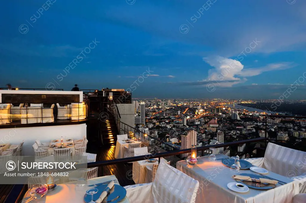 View of the city, Vertigo Bar and Restaurant, roof of the Banyan Tree Hotel, at dusk, Bangkok, Thailand, Asia