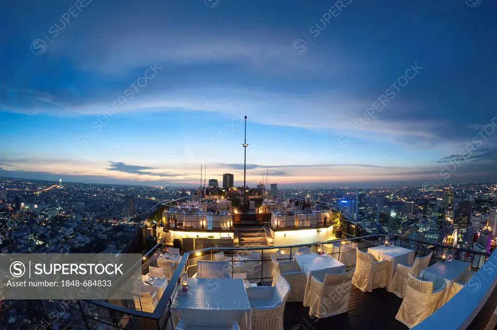 View of the city, Vertigo Bar and Restaurant, roof of the Banyan Tree Hotel, at dusk Bangkok, Thailand, Asia