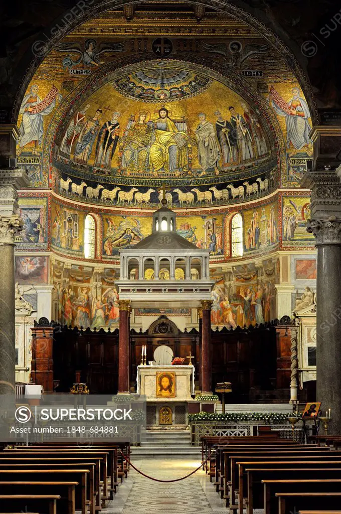 Nave with triumphal arch, altar with marble ciborium or canopy and apse mosaics by Cavallini Basilica Santa Maria in Trastevere, Rome, Lazio, Italy, E...