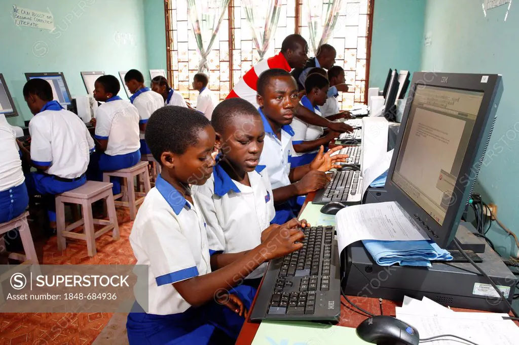 Students in school uniform during computer lessons, Kumba, Cameroon, Africa