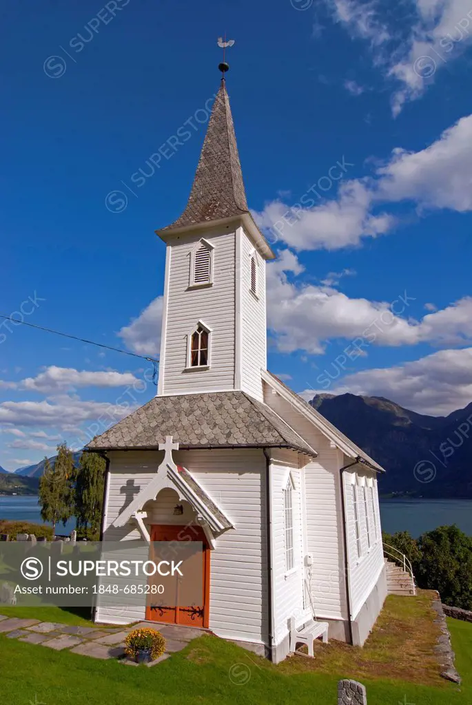 Nes Kyrkje Church against a blue sky with some clouds, Norway, Europe