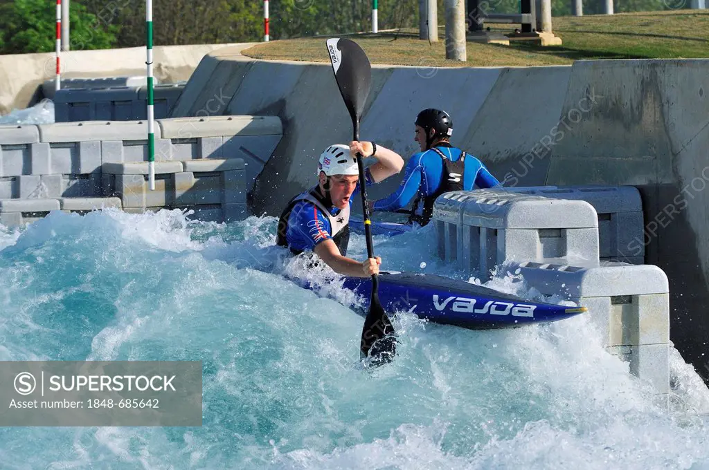 A canoeist at the 2012 Olympic White Water Centre on opening day, Lee Valley White Water Centre, Hertfordshire, England, United Kingdom, Europe