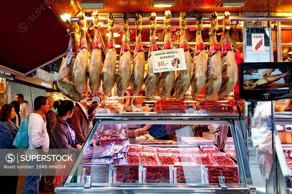 Ham on sale, Mercat de la Boqueria, market hall, La Rambla, Barcelona, Catalonia, Spain, Europe