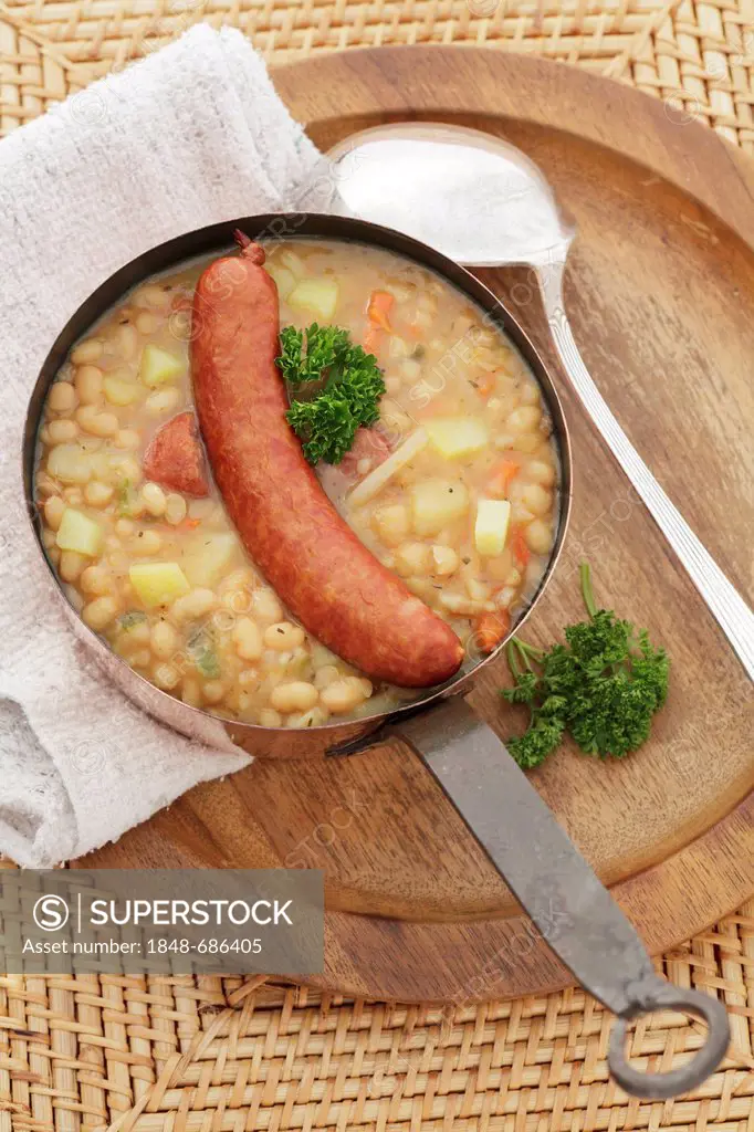 Stew of white beans with smoked sausage