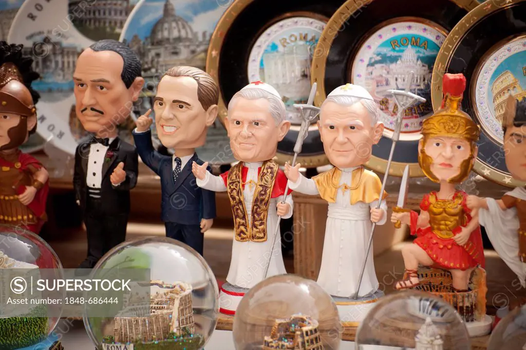 Toy figures of Popes Benedict and John Paul and Silvio Berlusconi at a souvenir shop in Rome, Italy, Europe