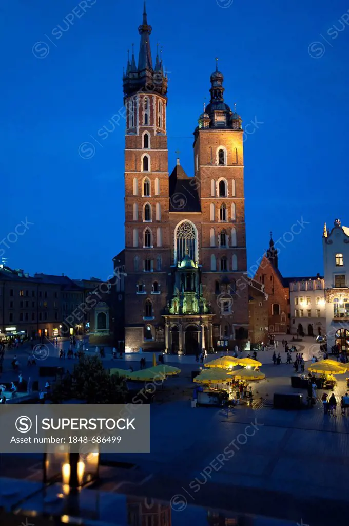 St. Mary's Church at dusk as seen from the terrace on top of the Cloth Hall, Rynek or market square, Krakow, Malopolska, Poland, Europe