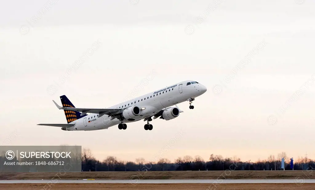 Lufthansa subsidiary Augsburg Airways Embraer ERJ190-200LR airplane during takeoff from Munich Airport, Bavaria, Germany, Europe