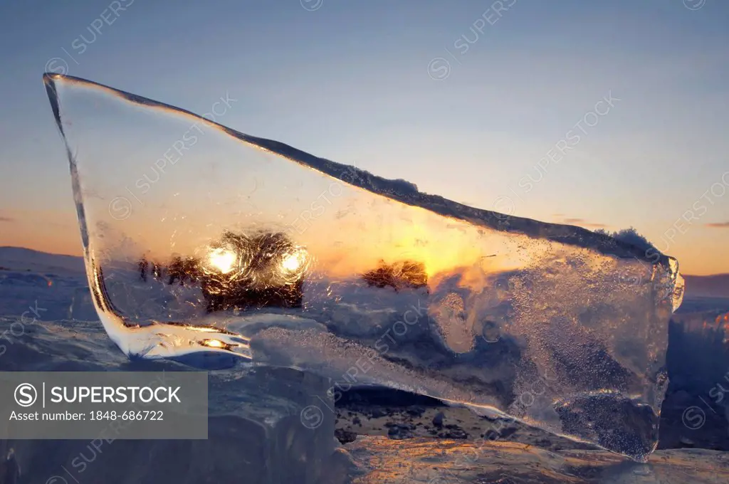 Car seen through a piece of ice, Olkhon island, Lake Baikal, Siberia, Russia, Eurasia