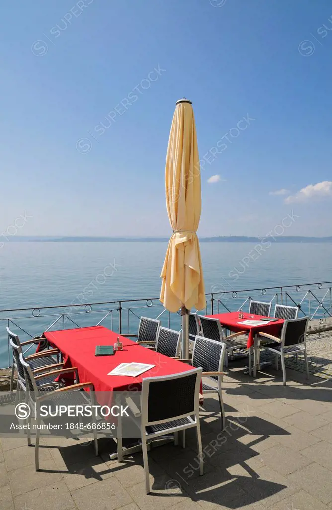 Tables and empty chairs, waterfront, Meersburg on Lake Constance, Baden-Wuerttemberg, Germany, Europe