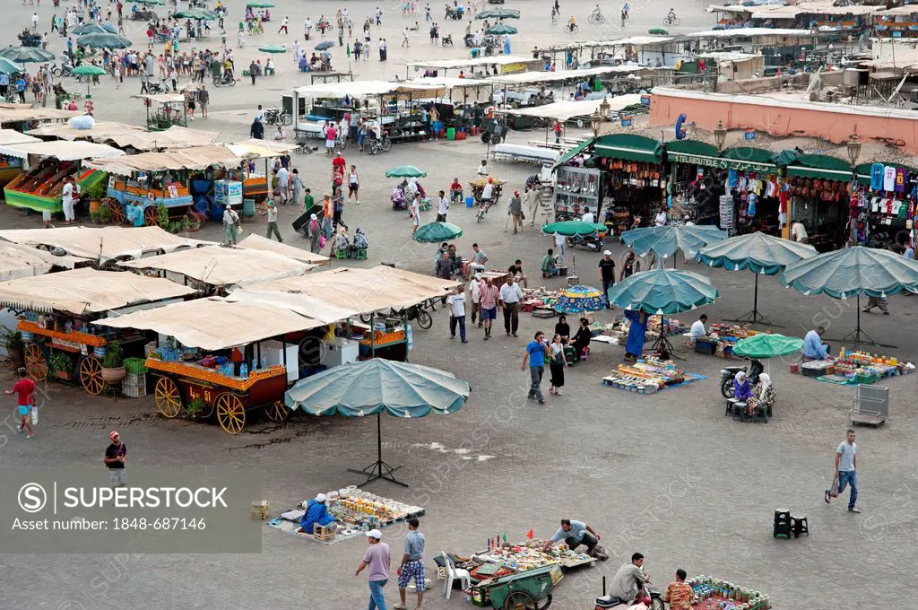 Hustle and bustle on the Jemaa el-Fnaa square, UNESCO World Heritage Site, in Marrakech, Morocco, North Africa, Africa