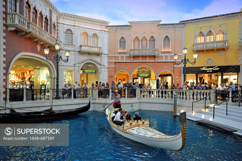 Tourists in simulated Venetian alleys under an artificial sky, a wedding ceremony in a wedding gondola, 5-star luxury hotel, The Venetian Casino, Las ...