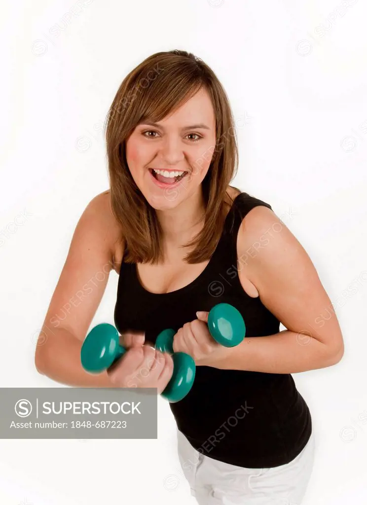 Young woman wearing sportswear holding free weights
