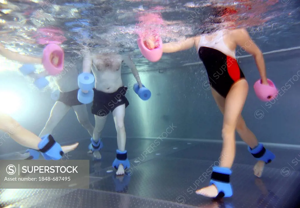 Patients doing aqua aerobics, water aerobics, exercise therapy, physiotherapy in water, e.g. as a rehabilitation program, in a hospital in Germany, Eu...