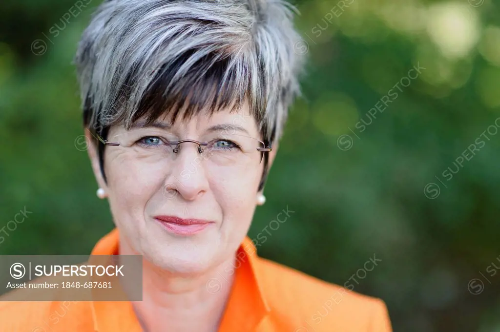 Woman, 50+, short grey hair, portrait