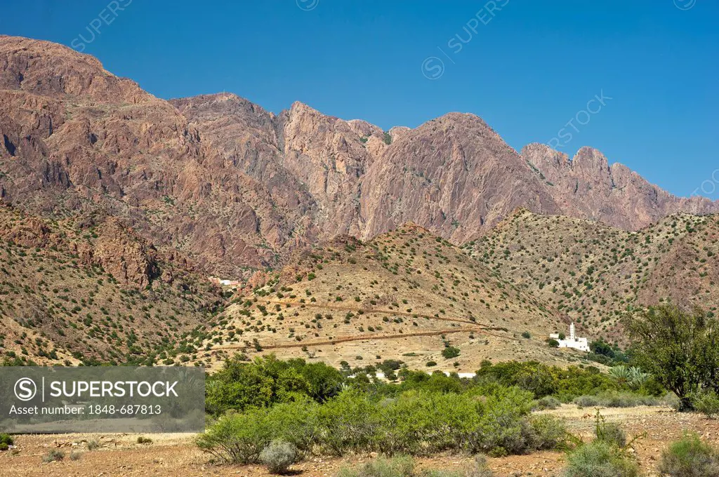 Typical mountain landscape in the Anti-Atlas Mountains, a mosque with minaret on a hill, Anti-Atlas mountain range, southern Morocco, Africa