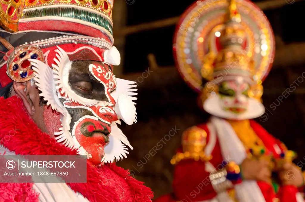 The Kathakali character Bali on stage with Ravana, Perattil, Kerala, India, Asia