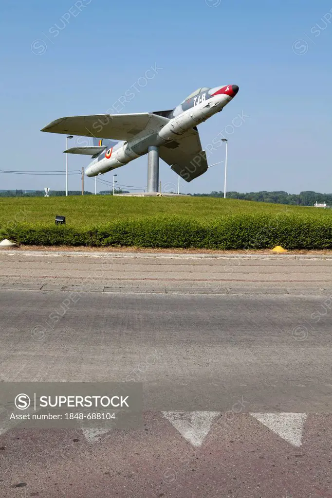 Belgian fighter aircraft from the 1960s displayed on a roundabout near Chièvres, province of Hainaut, Wallonia, Belgium, Europe