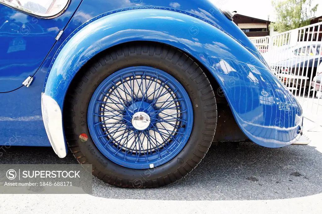 Rear wheel of a vintage car, Bugatti 57 SC Atlantic, built in 1937, iconic vehicle of automotive construction, only 4 examples were produced, this is ...