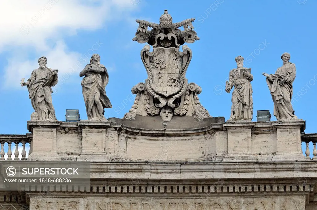 Pope's insignia between four statues of saints on the colonnades, St. Peter's Square, Vatican City, Rome, Latium region, Italy, Europe