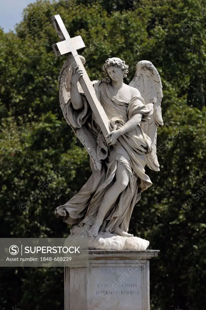 Statue of an angel holding a cross on Ponte Sant'Angelo bridge, Aelian Bridge, Castel Sant'Angelo, also known as Mausoleum of Hadrian, Rome, Latium re...
