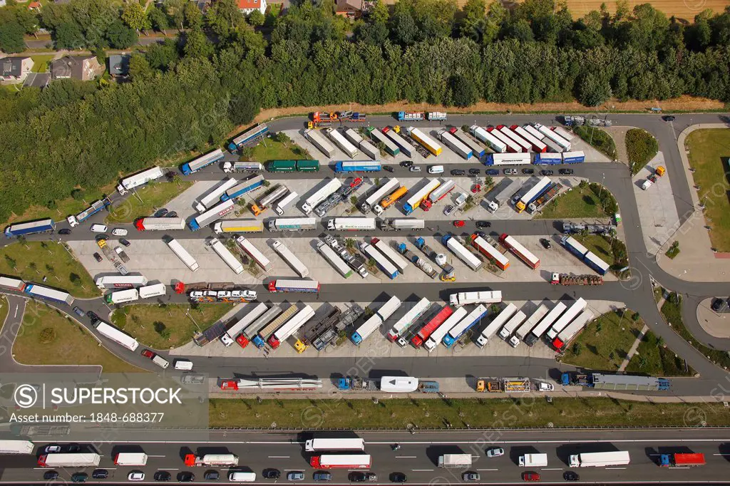 Aerial view, overcrowded Rhynern-Nord motorway service area, rest and driving times of lorry drivers, Hamm, Ruhr area, North Rhine-Westphalia, Germany...