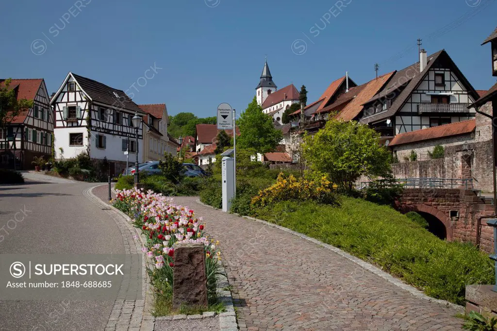 Waldbachstrasse street with the city wall and Liebfrauenkirche Church, Gernsbach climatic spa, Murgtal valley, Black Forest mountain range, Baden-Wuer...