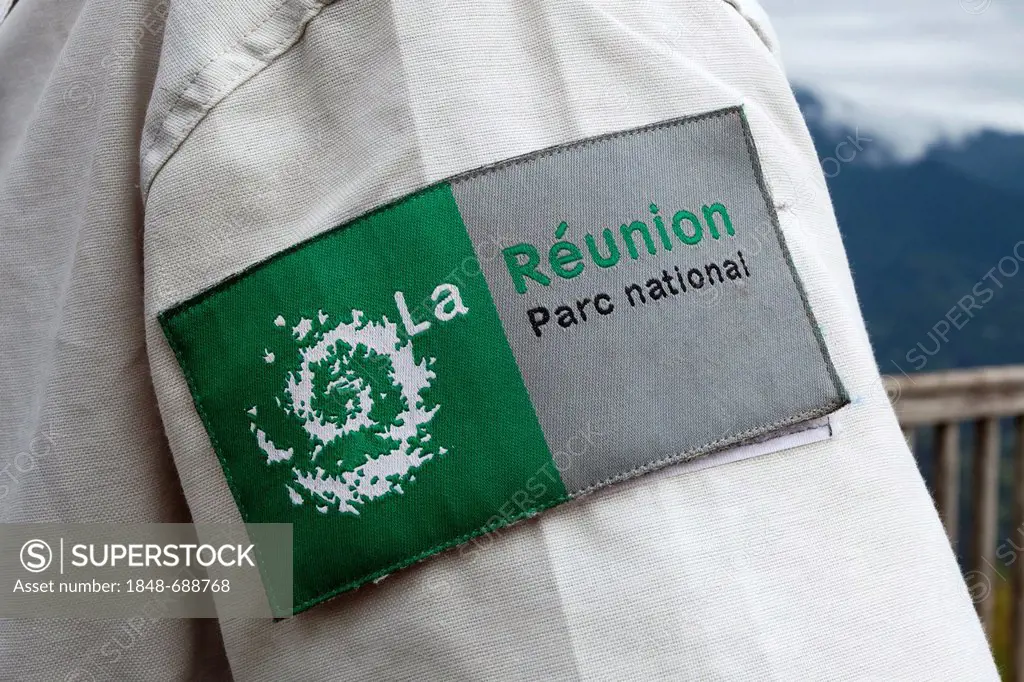 Logo, badge on the shirt of an ranger, National Park Service, La Reunion national park, Reunion island, Indian Ocean