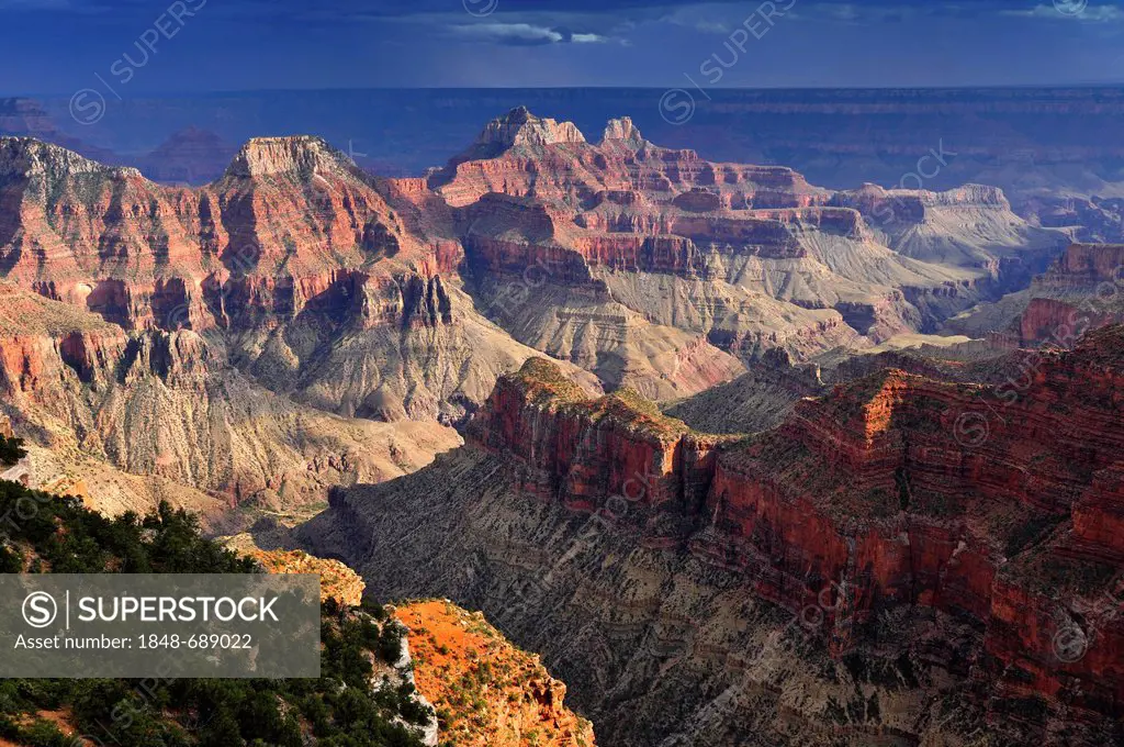 Storm, view from Bright Angel Point towards Deva Temple, Brahma Temple, Zoroaster Temple, Transept Canyon, Bright Angel Canyon, evening mood at sunset...