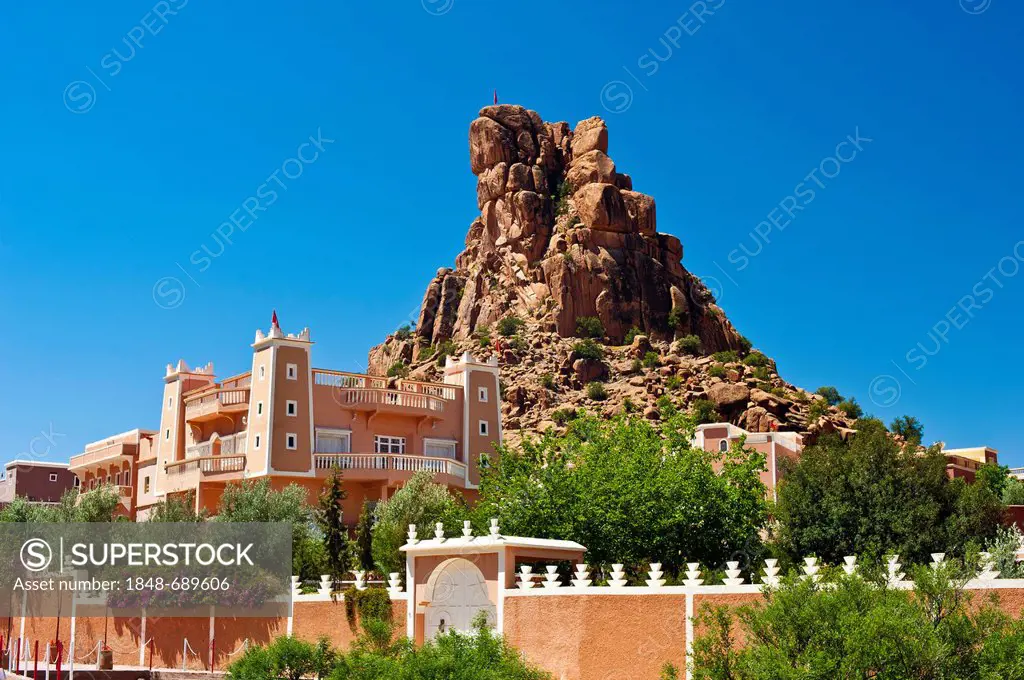 Modern, newly built Kasbah, a Berber residential stronghold, in front of the imposing rocks of Chapeau Napoleon, Napoleon's Hat, Tafraoute, Anti-Atlas...