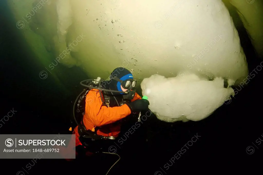 Diver, ice-diving in White Sea, Karelia, north Russia, Arctic