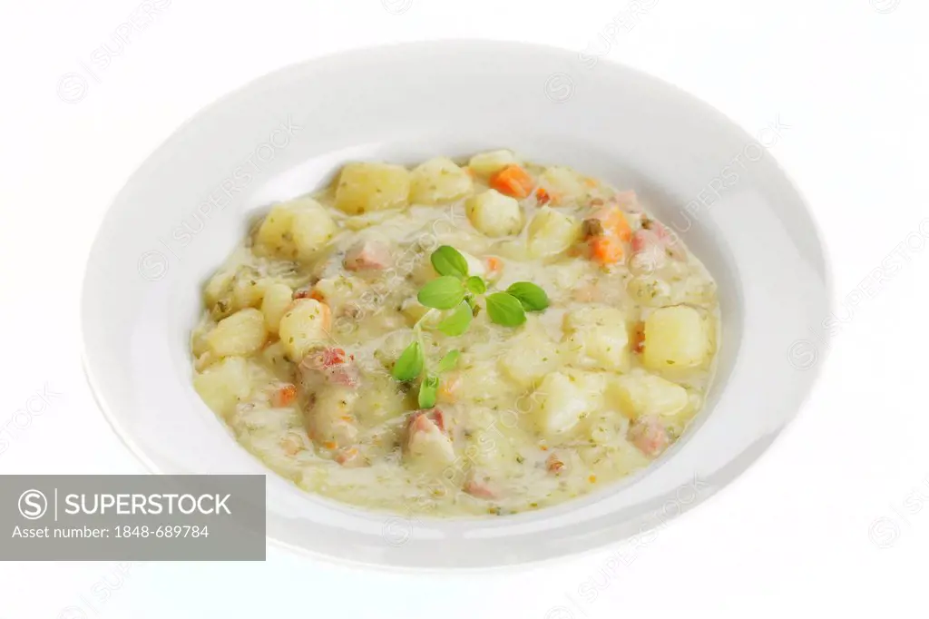 Potato soup with smoked meat cubes, gammon ham
