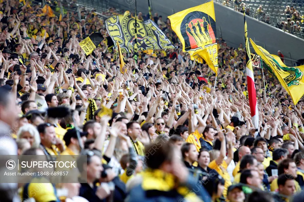 Fans of BVB Borussia Dortmund 09 football club on the south stand, Signal Iduna Park football arena, Dortmund, North Rhine-Westphalia, Germany, Europe