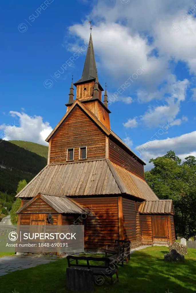 Kaupanger Stave Church against a blue sky with some clouds, Norway, Europe