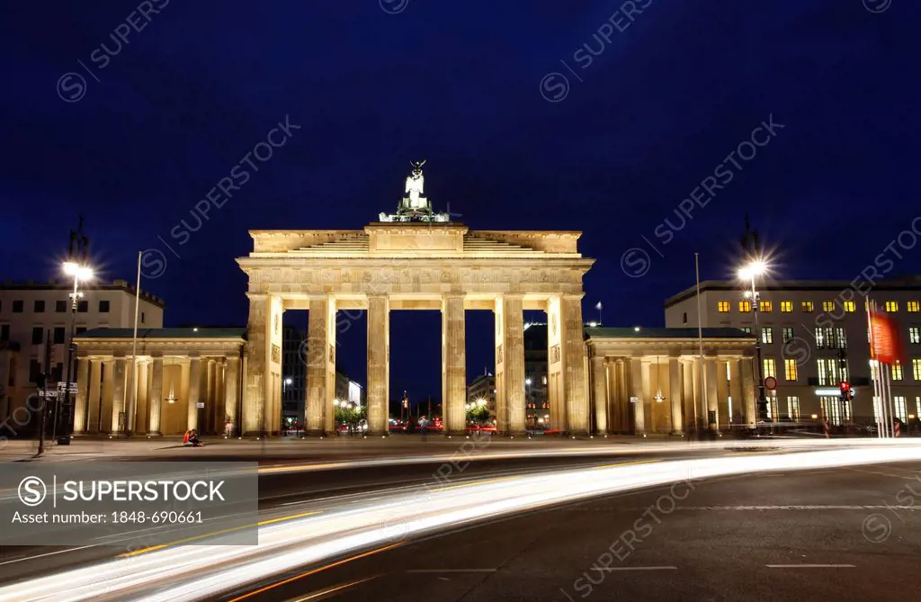Light trails in front of Brandenburg Gate at dusk, Pariser Platz square, Berlin, Germany, Europe