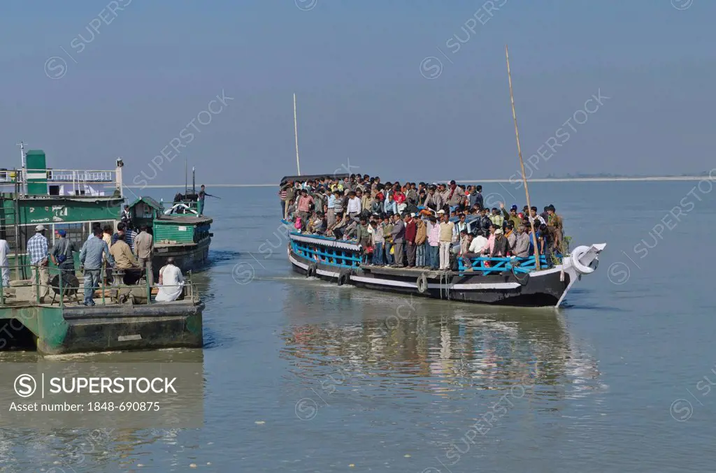 Rustic ferry-boats at Jorhat take more than one hour to cross the mighty Brahmaputra River, India, Asia