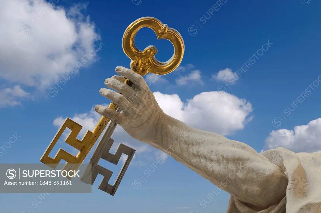 Arm of St. Peter with the key of heaven in front of a cloudy blue sky, Salzburg Cathedral, UNESCO World Heritage Site, Salzburg, Austria, Europe