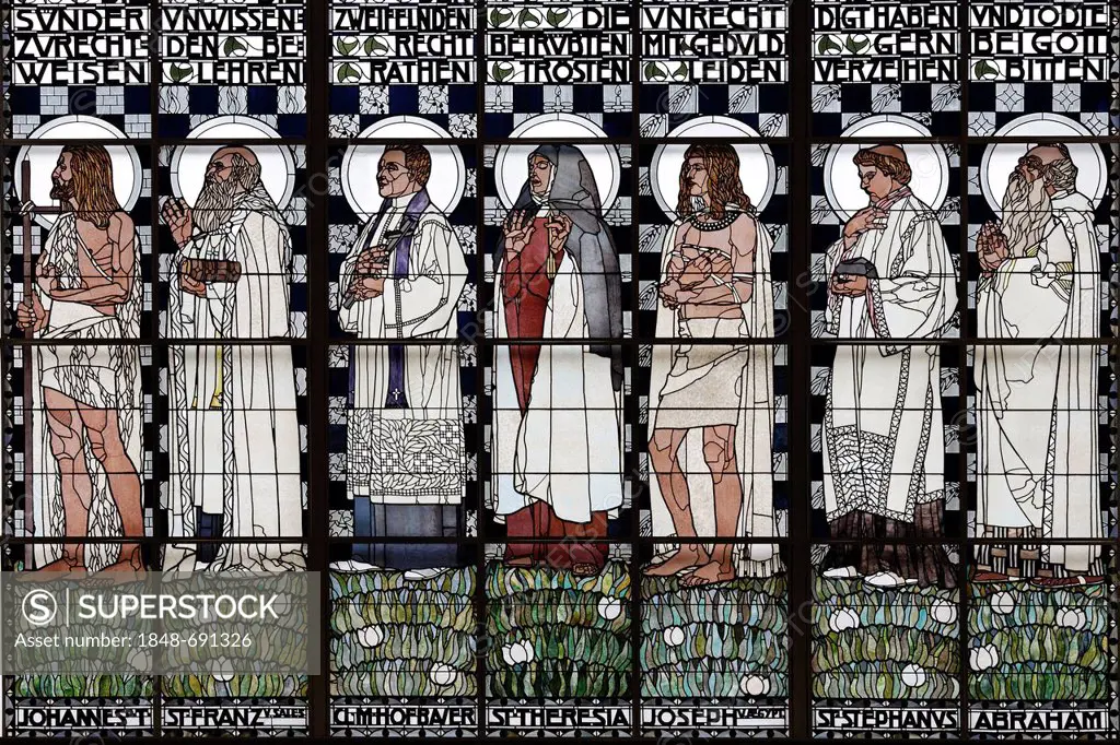 Statues of holy men, Art Nouveau stained glass window by Kolo Moser, Kirche Am Steinhof church, by Otto Wagner, Baumgartner Hoehe heights, Vienna, Aus...