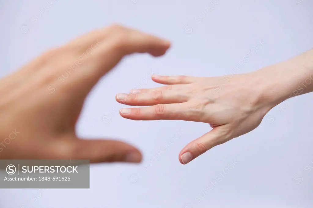Hand reaching for another hand