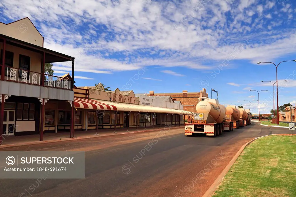 Shops and trucks in Austin Street, Cue Murchison, Western Australia, Australia