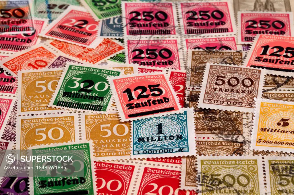 Old, partially postmarked stamps, inflation, Germany, 1923