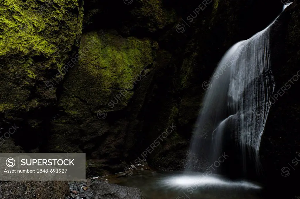 Cave waterfall in the Stakkholtsgjá gorge, Þórsmoerk or Thorsmoerk mountain ridge, Icelandic highlands, Southern Iceland, Iceland, Europe