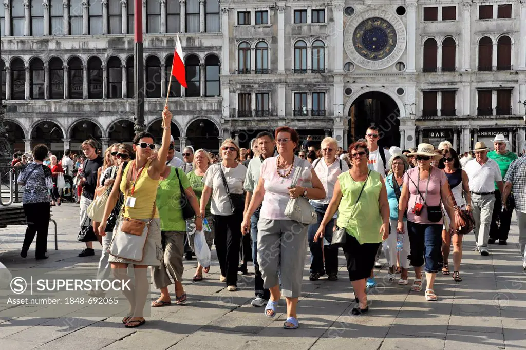 Tourists in a tour group, St. Mark's Square, Venice, Veneto, Italy, Europe