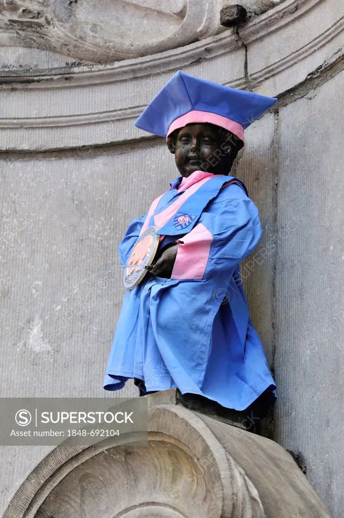 Manneken Pis or le Petit Julien, wearing a costume from the advertising of a chocolate factory, fountain figure of a boy urinating, sculptor Jerome Du...