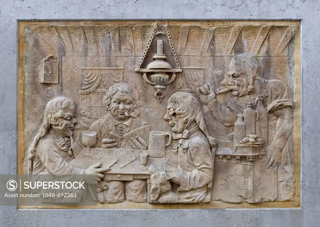 Stone carving, three happy card players and a patron in a tavern, Koblenz, Rhineland-Palatinate, Germany, Europe