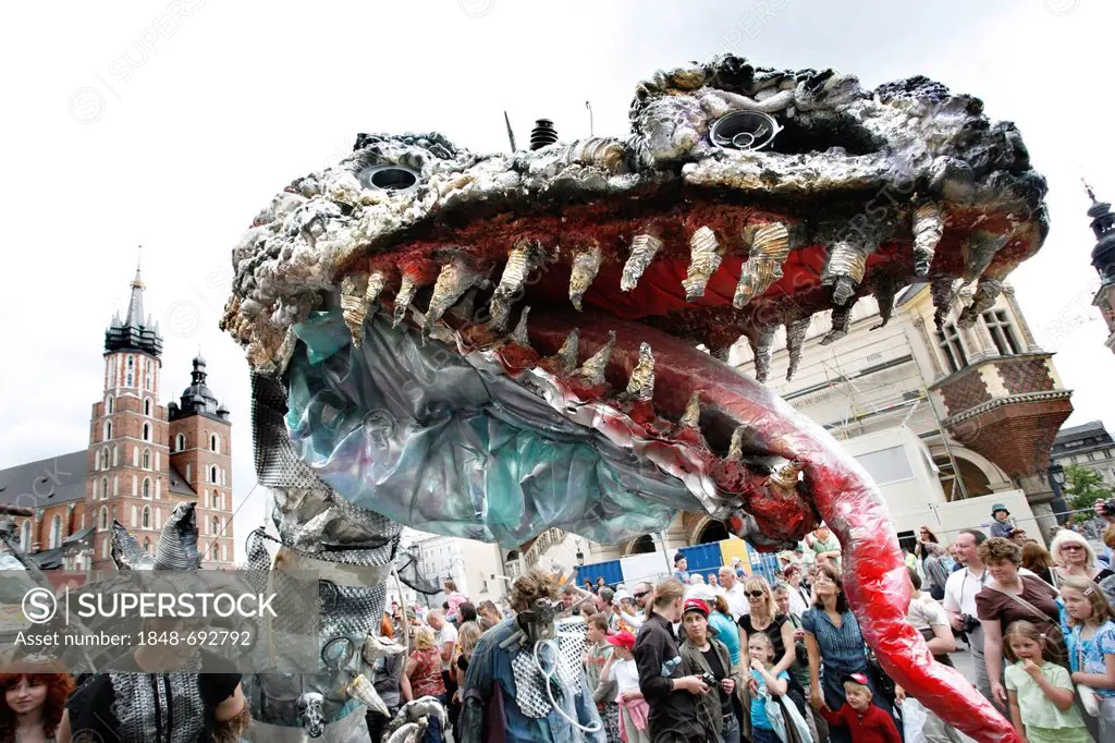 Dragon figure during a parade with spectators, market square, Krakow, Poland, Europe