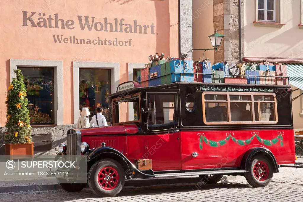 Kaethe Wohlfahrt Weihnachtsdorf shop, a vintage car parking in front of it, Rothenburg ob der Tauber, Franconia, Bavaria, Germany, Europe